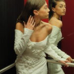 Bold Bride Unbound wedding dress, with a sleek design and detailed floral lace patterns Photo 02