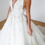 Princess ball gown wedding dress with deep V-neck and lace detailing, The Princess Cut Photo 03