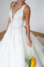 Princess ball gown wedding dress with deep V-neck and lace detailing, The Princess Cut Photo 03