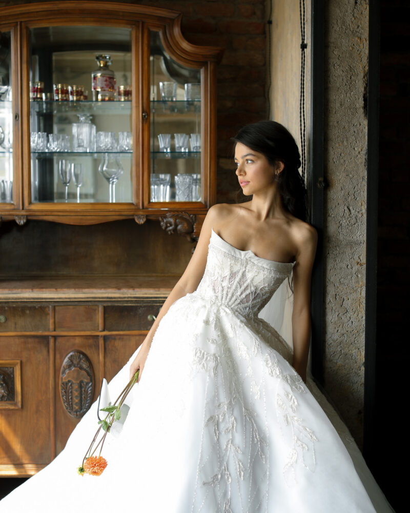 Sleeveless ball gown wedding dress with intricate lace detailing and handcrafted crystals, Fairy Tale Photo 01